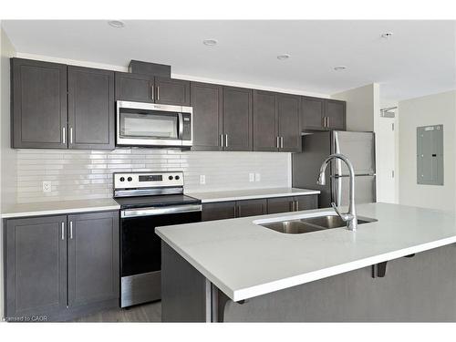 214-5 Wake Robin Drive, Kitchener, ON - Indoor Photo Showing Kitchen With Stainless Steel Kitchen With Double Sink With Upgraded Kitchen