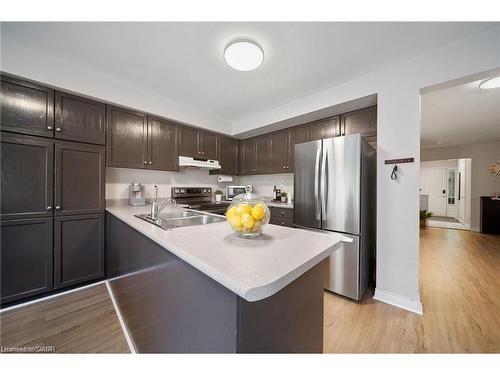 10-320 Hamilton Drive, Ancaster, ON - Indoor Photo Showing Kitchen With Double Sink