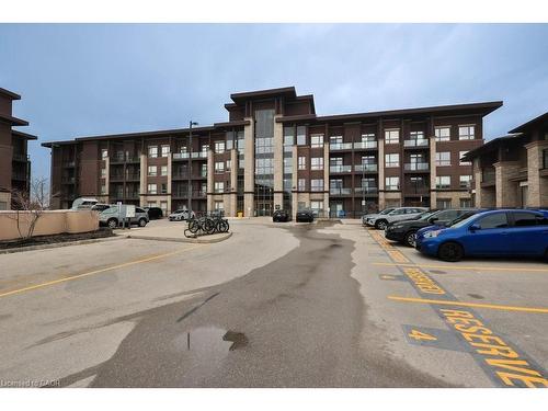 417-5020 Corporate Drive, Burlington, ON - Outdoor With Balcony With Facade