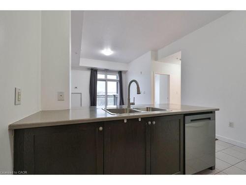 417-5020 Corporate Drive, Burlington, ON - Indoor Photo Showing Kitchen With Double Sink