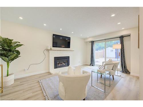 243 Highview Drive, Kitchener, ON - Indoor Photo Showing Living Room With Fireplace