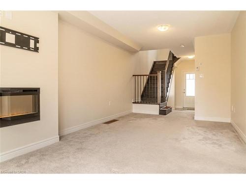 3092 Michelangelo Road, Burlington, ON - Indoor Photo Showing Other Room With Fireplace