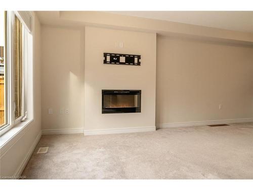 3092 Michelangelo Road, Burlington, ON - Indoor Photo Showing Other Room With Fireplace