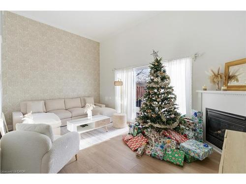 65-11 Harrisford Street, Hamilton, ON - Indoor Photo Showing Living Room With Fireplace