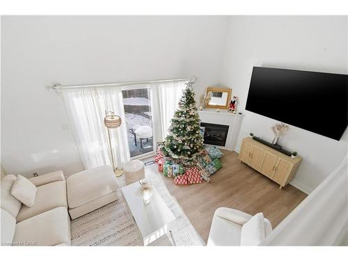 65-11 Harrisford Street, Hamilton, ON - Indoor Photo Showing Living Room With Fireplace