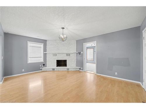 76 Main Street E, Mapleton, ON - Indoor Photo Showing Other Room With Fireplace