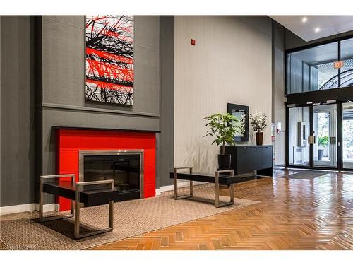 612-66 Bay Street S, Hamilton, ON - Indoor With Fireplace