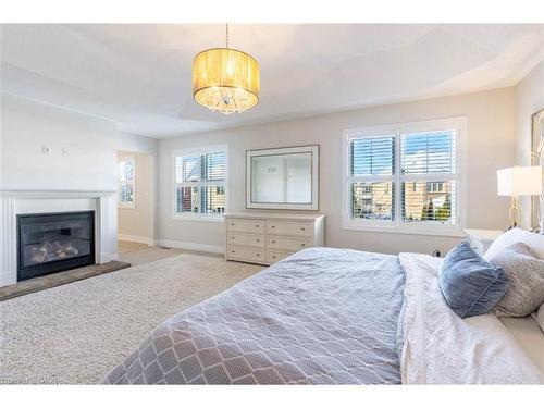 149 Forbes Terrace, Milton, ON - Indoor Photo Showing Bedroom With Fireplace