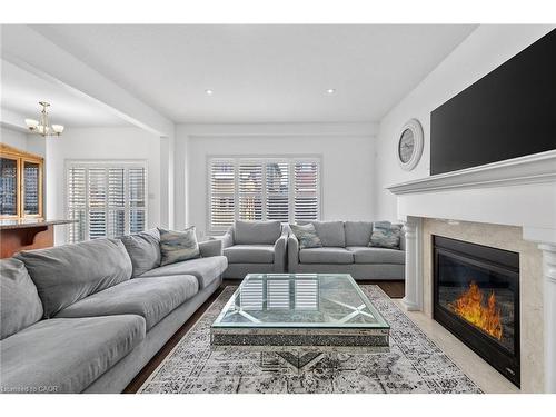 63 Chamomile Drive, Hamilton, ON - Indoor Photo Showing Living Room With Fireplace