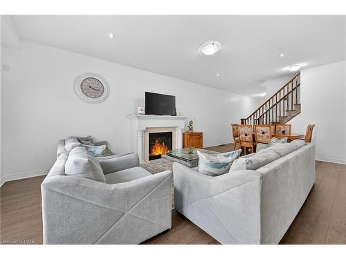 63 Chamomile Drive, Hamilton, ON - Indoor Photo Showing Living Room With Fireplace