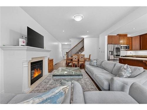 63 Chamomile Drive, Hamilton, ON - Indoor Photo Showing Living Room With Fireplace