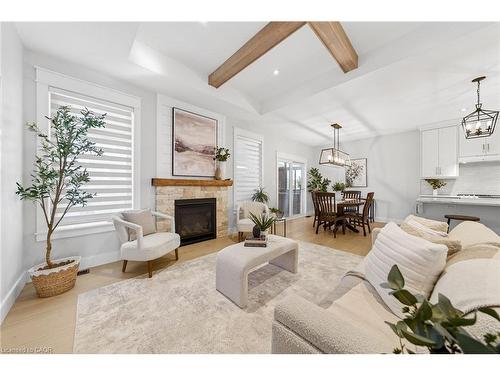 23-24 Craddock Boulevard, Jarvis, ON - Indoor Photo Showing Living Room With Fireplace