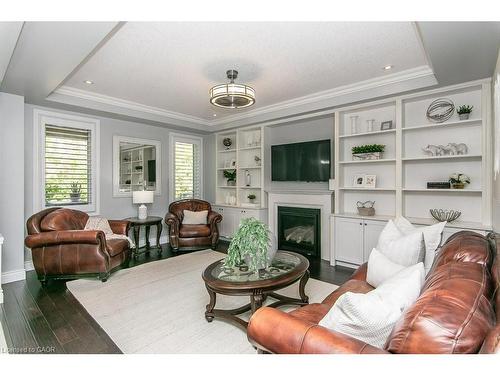 19 Tremaine Drive, Kitchener, ON - Indoor Photo Showing Living Room With Fireplace