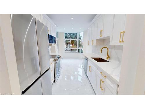 105-35 Kingsbridge Garden Circle, Mississauga, ON - Indoor Photo Showing Kitchen With Upgraded Kitchen