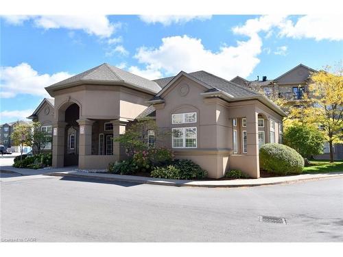 103-2035 Appleby Line, Burlington, ON - Outdoor With Facade