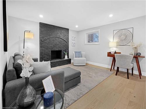 3406 Putter Place, Burlington, ON - Indoor Photo Showing Living Room With Fireplace