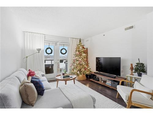 405-4450 Fairview Street, Burlington, ON - Indoor Photo Showing Living Room