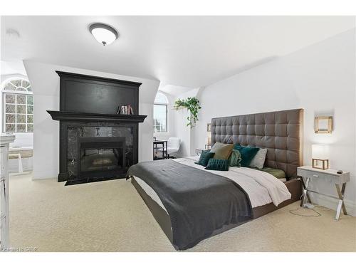 42573 Highway 3, Wainfleet, ON - Indoor Photo Showing Bedroom With Fireplace