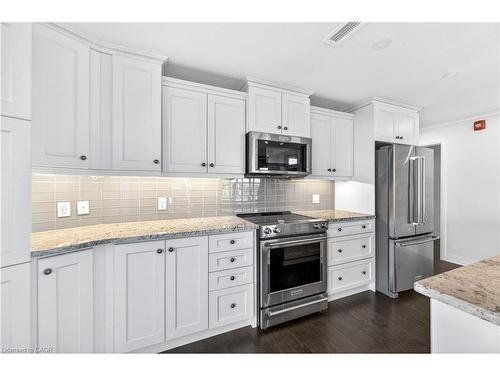 408-10 Concord Place, Grimsby, ON - Indoor Photo Showing Kitchen With Upgraded Kitchen