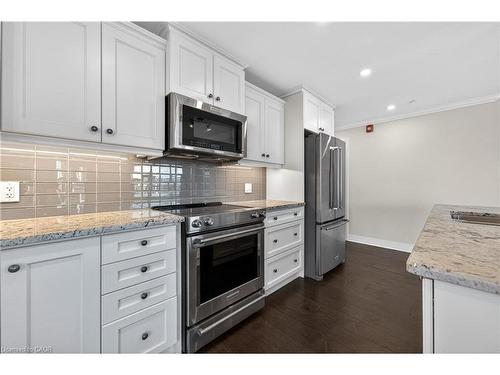 408-10 Concord Place, Grimsby, ON - Indoor Photo Showing Kitchen With Upgraded Kitchen