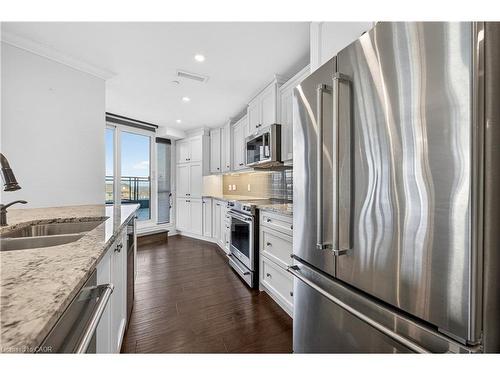 408-10 Concord Place, Grimsby, ON - Indoor Photo Showing Kitchen With Double Sink With Upgraded Kitchen
