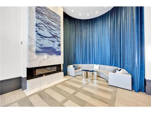 408-10 Concord Place, Grimsby, ON - Indoor With Fireplace