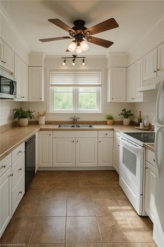 55 Mohawk Road W, Hamilton, ON - Indoor Photo Showing Kitchen With Double Sink
