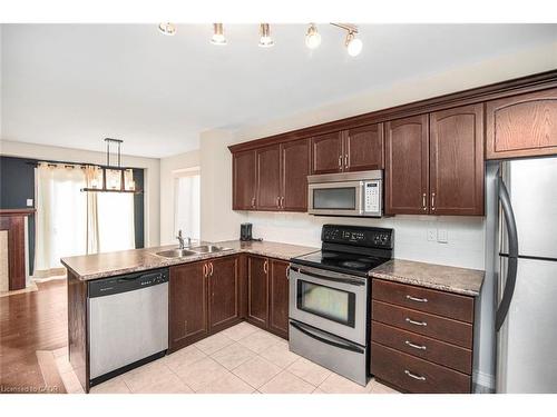 23-222 Fall Fair Way, Binbrook, ON - Indoor Photo Showing Kitchen With Double Sink