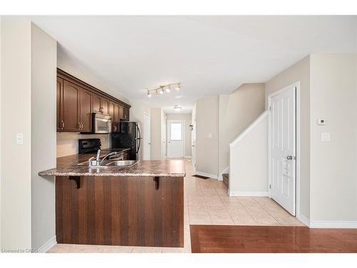23-222 Fall Fair Way, Binbrook, ON - Indoor Photo Showing Kitchen With Double Sink