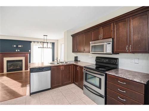 23-222 Fall Fair Way, Binbrook, ON - Indoor Photo Showing Kitchen With Double Sink