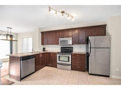 23-222 Fall Fair Way, Binbrook, ON - Indoor Photo Showing Kitchen With Double Sink