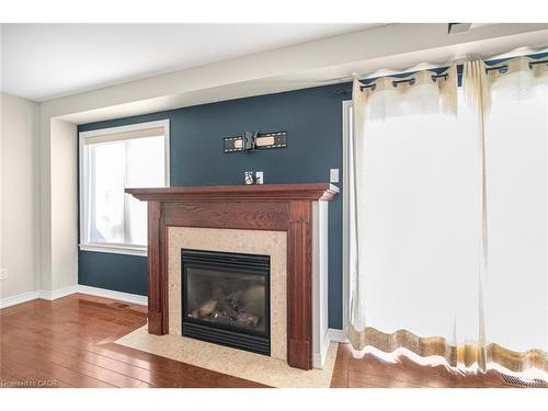 23-222 Fall Fair Way, Binbrook, ON - Indoor Photo Showing Living Room With Fireplace
