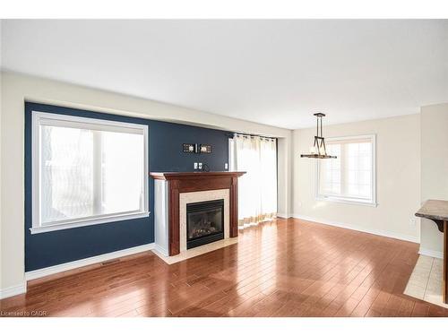23-222 Fall Fair Way, Binbrook, ON - Indoor Photo Showing Living Room With Fireplace