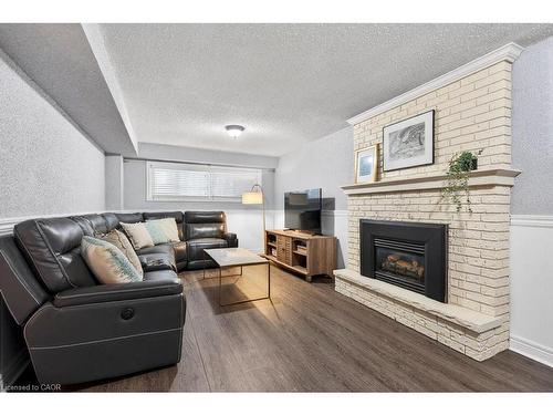 16 Forestgate Drive, Hamilton, ON - Indoor Photo Showing Living Room With Fireplace