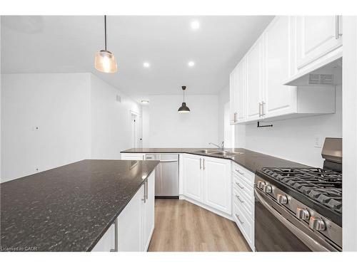 96 London Street N, Hamilton, ON - Indoor Photo Showing Kitchen With Double Sink With Upgraded Kitchen