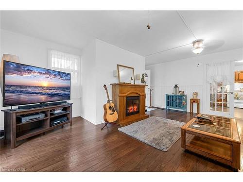 143 Walter Avenue S, Hamilton, ON - Indoor Photo Showing Living Room With Fireplace