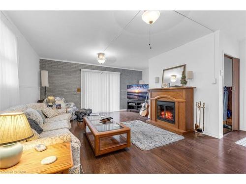 143 Walter Avenue S, Hamilton, ON - Indoor Photo Showing Living Room With Fireplace