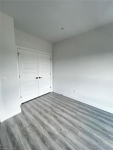 303-1000 Lackner Place, Kitchener, ON - Indoor Photo Showing Garage