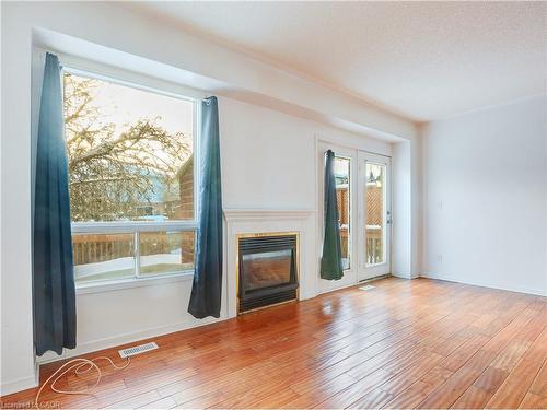 67 Northmanor Crescent, Kitchener, ON - Indoor Photo Showing Living Room With Fireplace