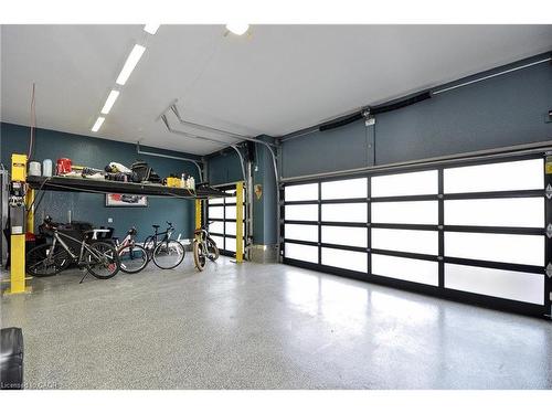 27 Woodmans Court, Kitchener, ON - Indoor Photo Showing Garage