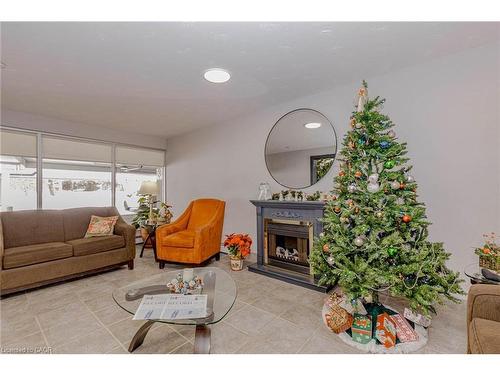 106-58 Bridgeport Road E, Waterloo, ON - Indoor Photo Showing Living Room With Fireplace