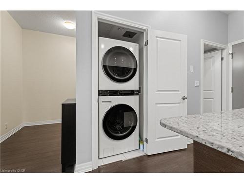 104-80 Esther Lorrie Drive, Toronto, ON - Indoor Photo Showing Laundry Room