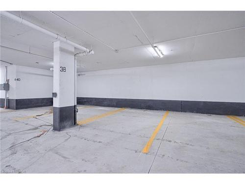 403-345 Wheat Boom Drive, Oakville, ON - Indoor Photo Showing Garage