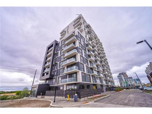 403-345 Wheat Boom Drive, Oakville, ON - Outdoor With Facade