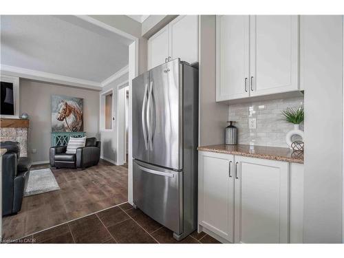 115 Larry Crescent, Caledonia, ON - Indoor Photo Showing Kitchen With Fireplace