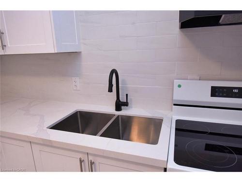 215 Walter Avenue S, Hamilton, ON - Indoor Photo Showing Kitchen With Double Sink