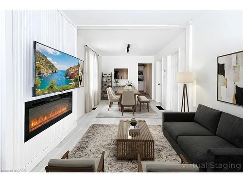 47 Gertrude Street, Hamilton, ON - Indoor Photo Showing Living Room With Fireplace