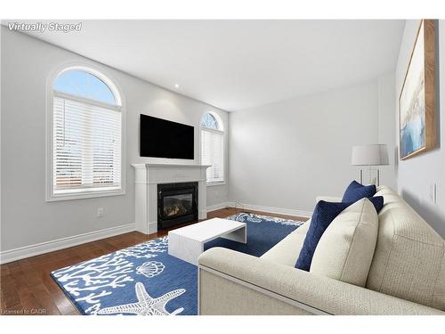 319 Duskywing Way, Oakville, ON - Indoor Photo Showing Living Room With Fireplace
