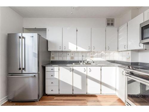 416-700 Dynes Road, Burlington, ON - Indoor Photo Showing Kitchen With Double Sink