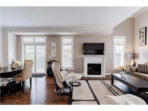 2 Celestial Crescent, Hannon, ON - Indoor Photo Showing Living Room With Fireplace